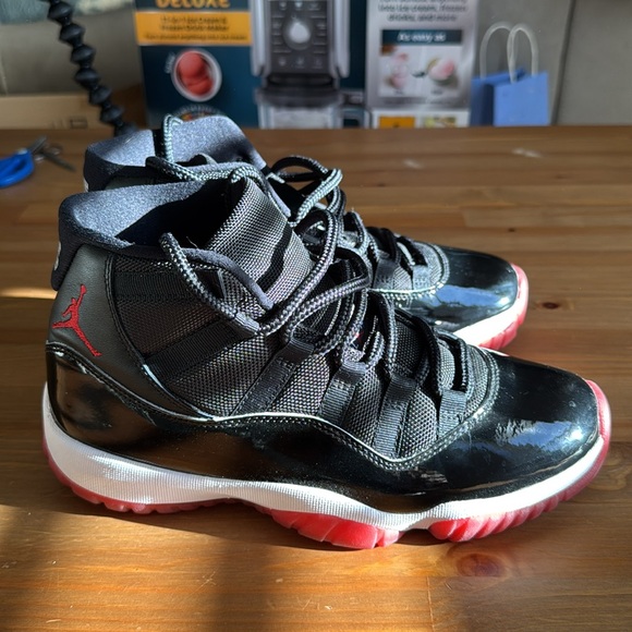 Men’s Air Jordan Bred 11s - Picture 4 of 11